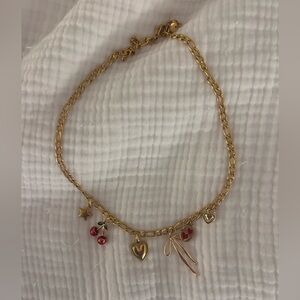 Gold charm necklace